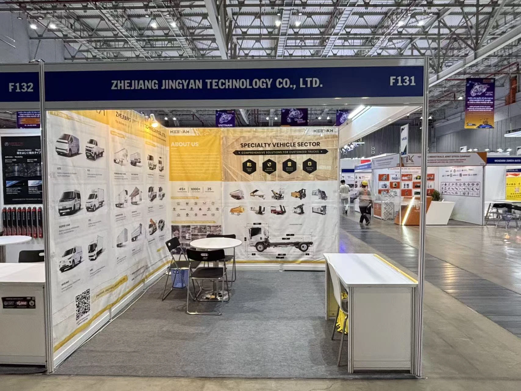 Original company photograph of the KEEYAK special-vehicle exhibition stand in Vietnam in May 2026