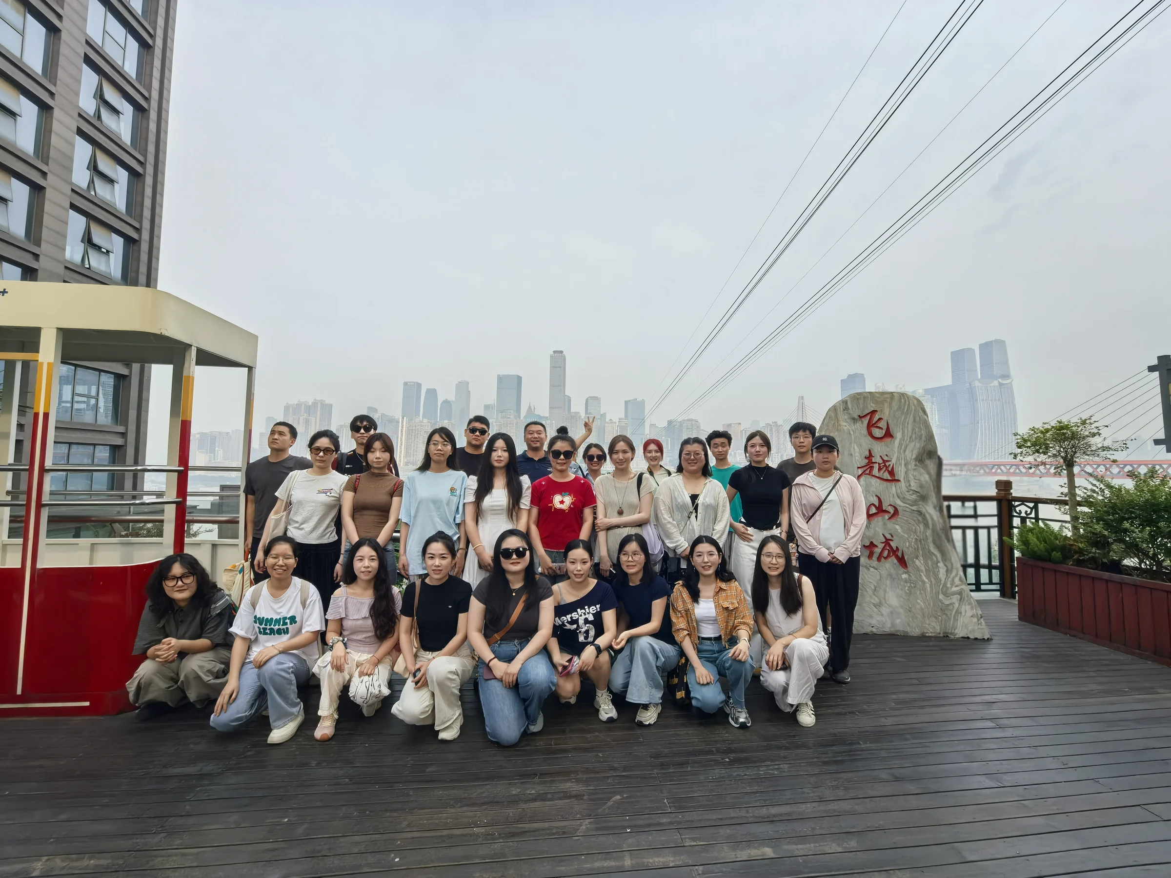 Original company photograph of KEEYAK colleagues in Chongqing in September 2025, without AI retouching
